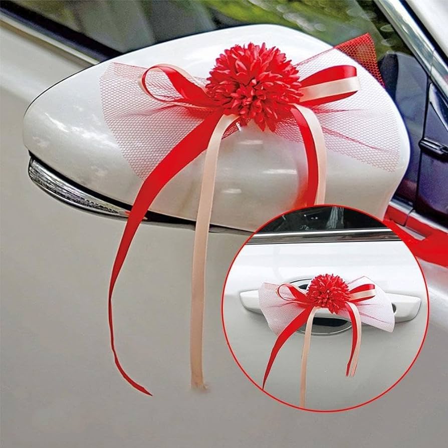Cinta roja atada en el retrovisor